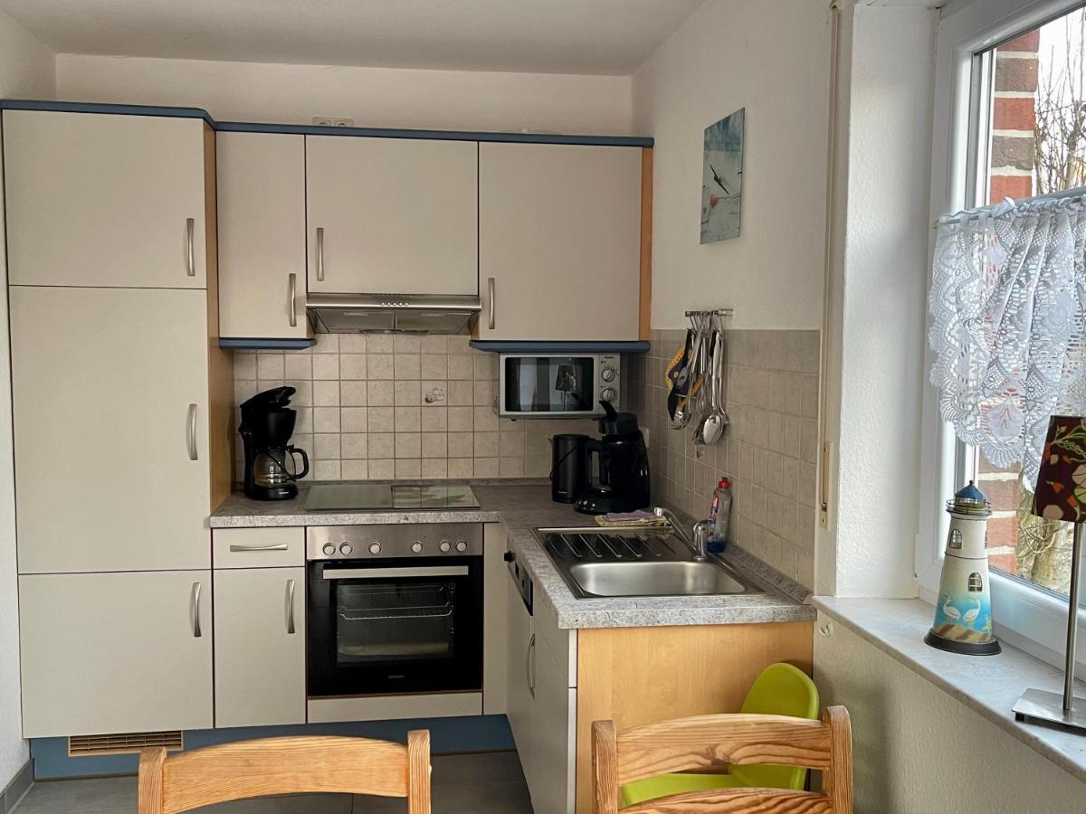 Ferienhaus Seehund Krummhörn エクステリア 写真